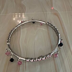Elegant Silver Bracelet with Pink and Black Charms